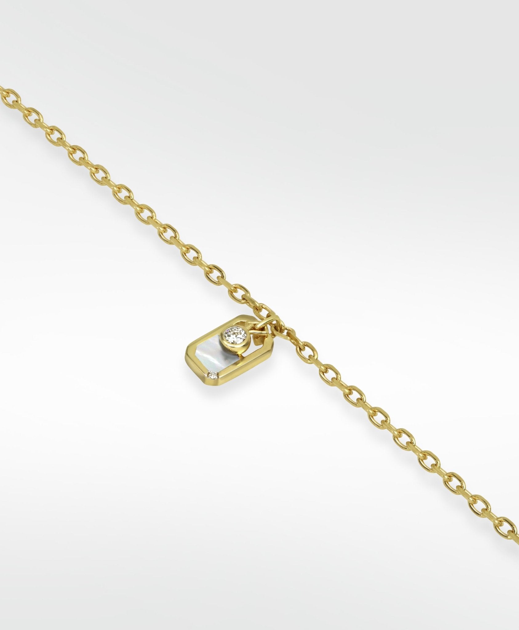 Eclipsis Charm bracelet with Onyx and Mother Of Pearl, in 18k Yellow Gold - Lark and Berry