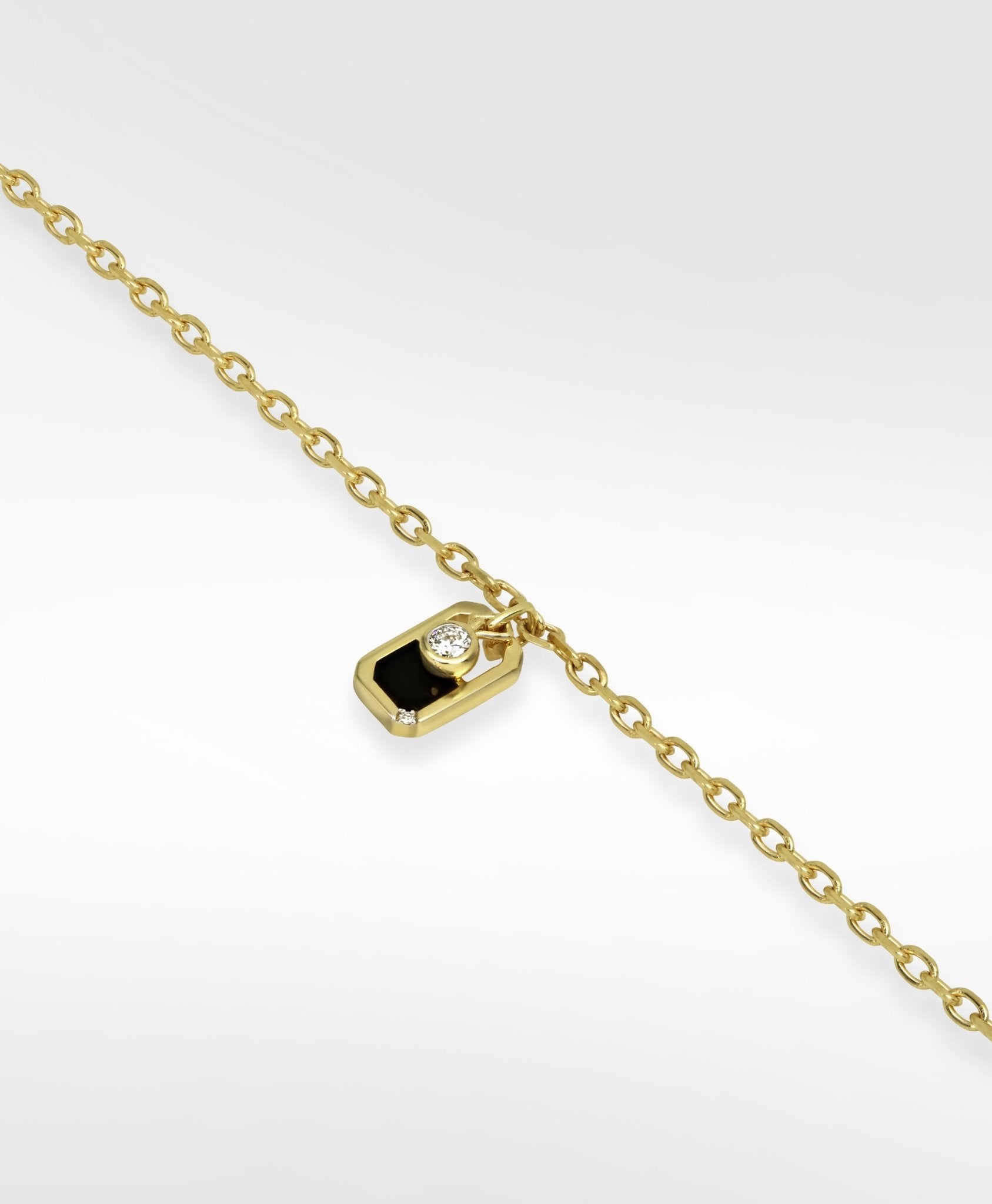 Eclipsis Charm bracelet with Onyx and Mother Of Pearl, in 18k Yellow Gold - Lark and Berry
