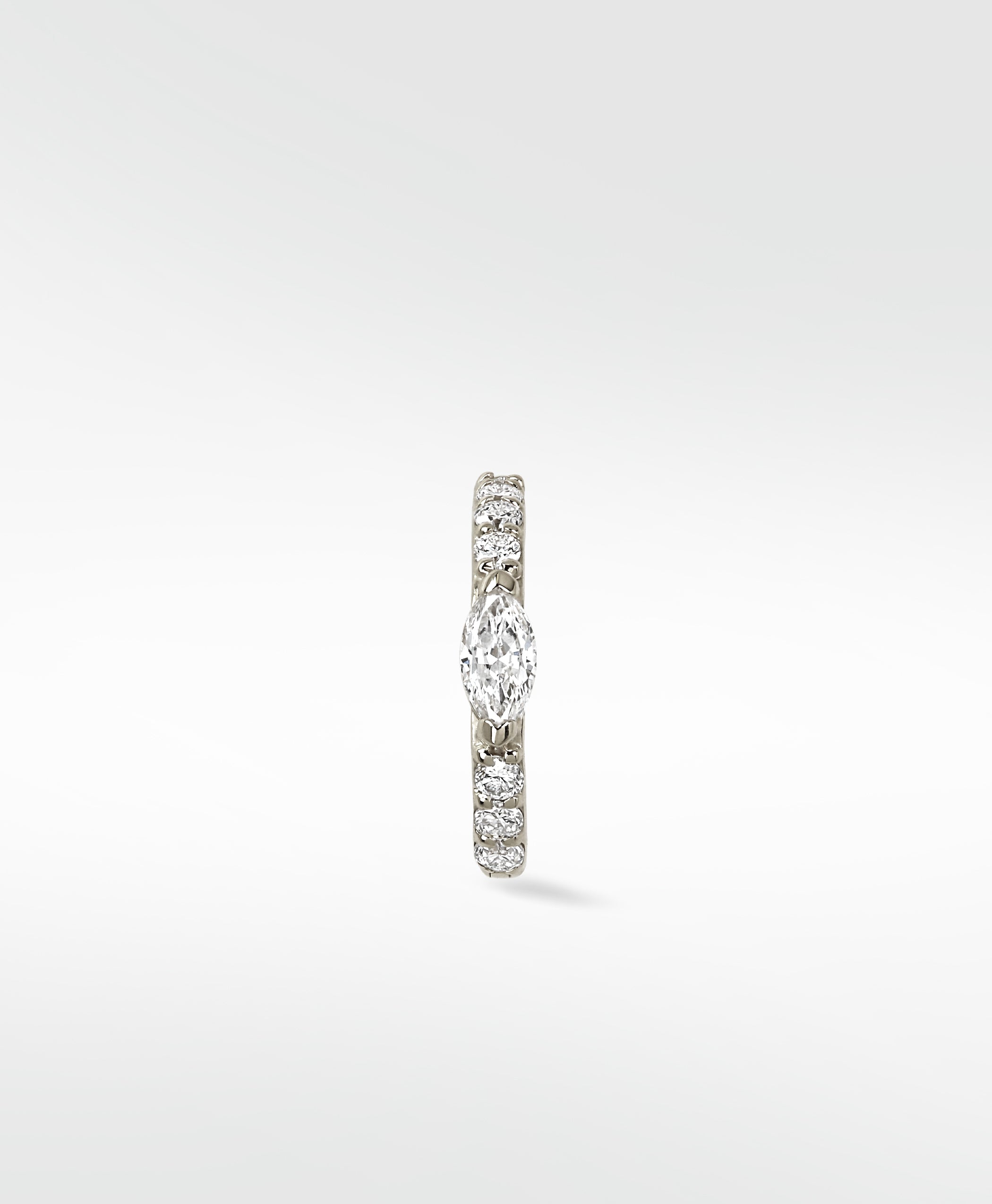 Modernist Marquise Pave Hoop earring in white gold with a central marquise diamond and brilliant cut pavé diamonds.