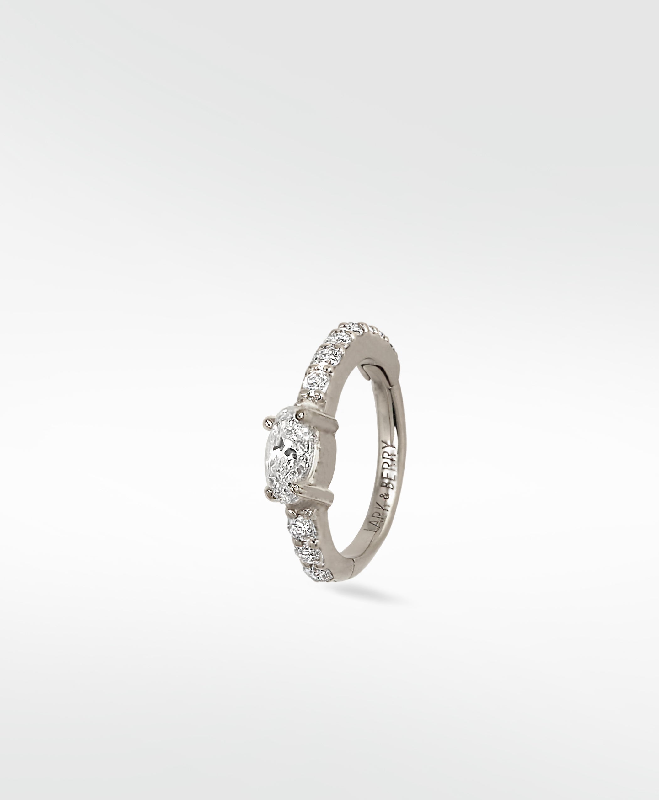 Lark & Berry Modernist Oval Diamond Hoop in white gold with a central oval diamond and pavé accents.