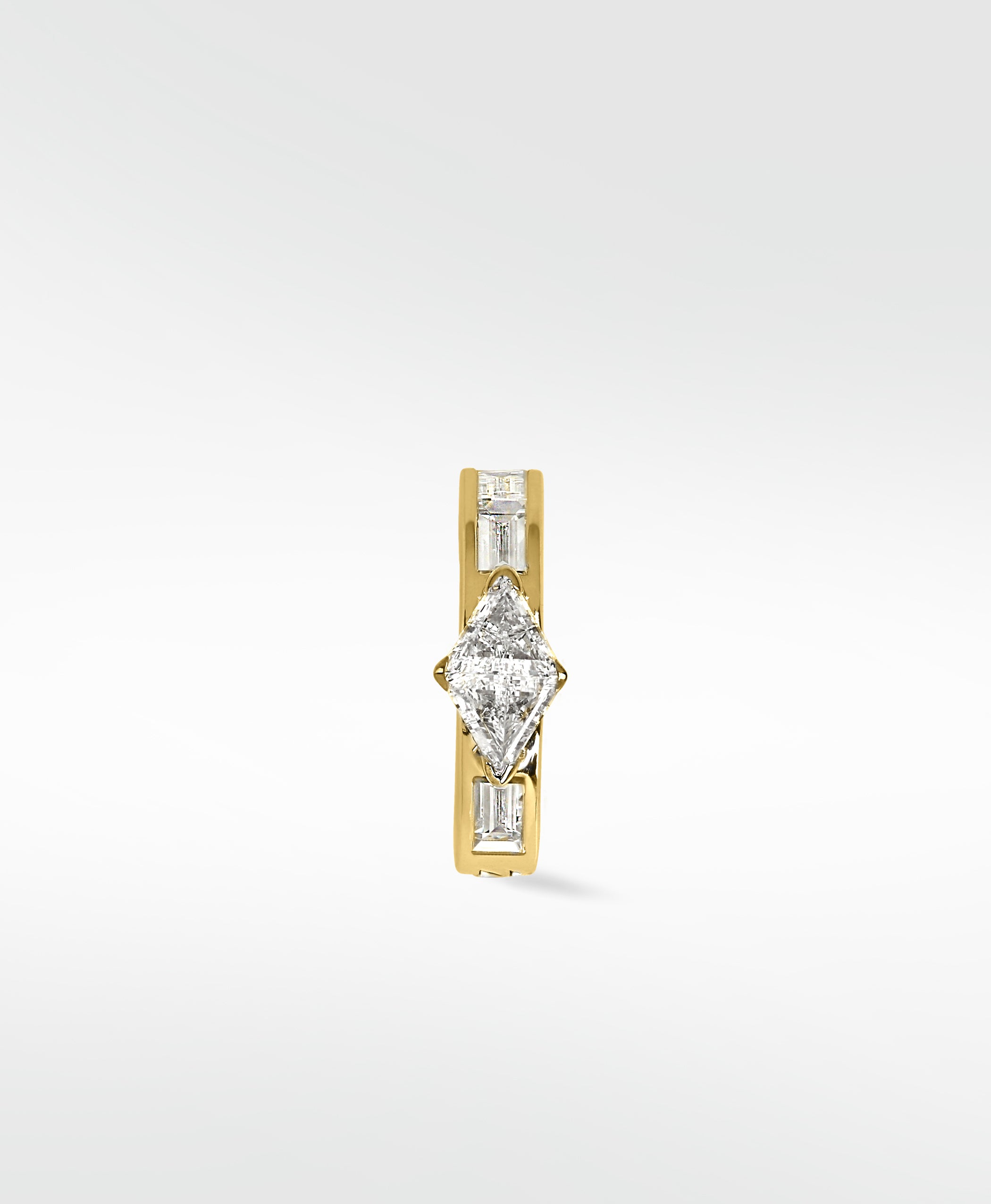 Front view of the Modernist gold hoop earring with a triangle diamond center and baguette diamond accents.