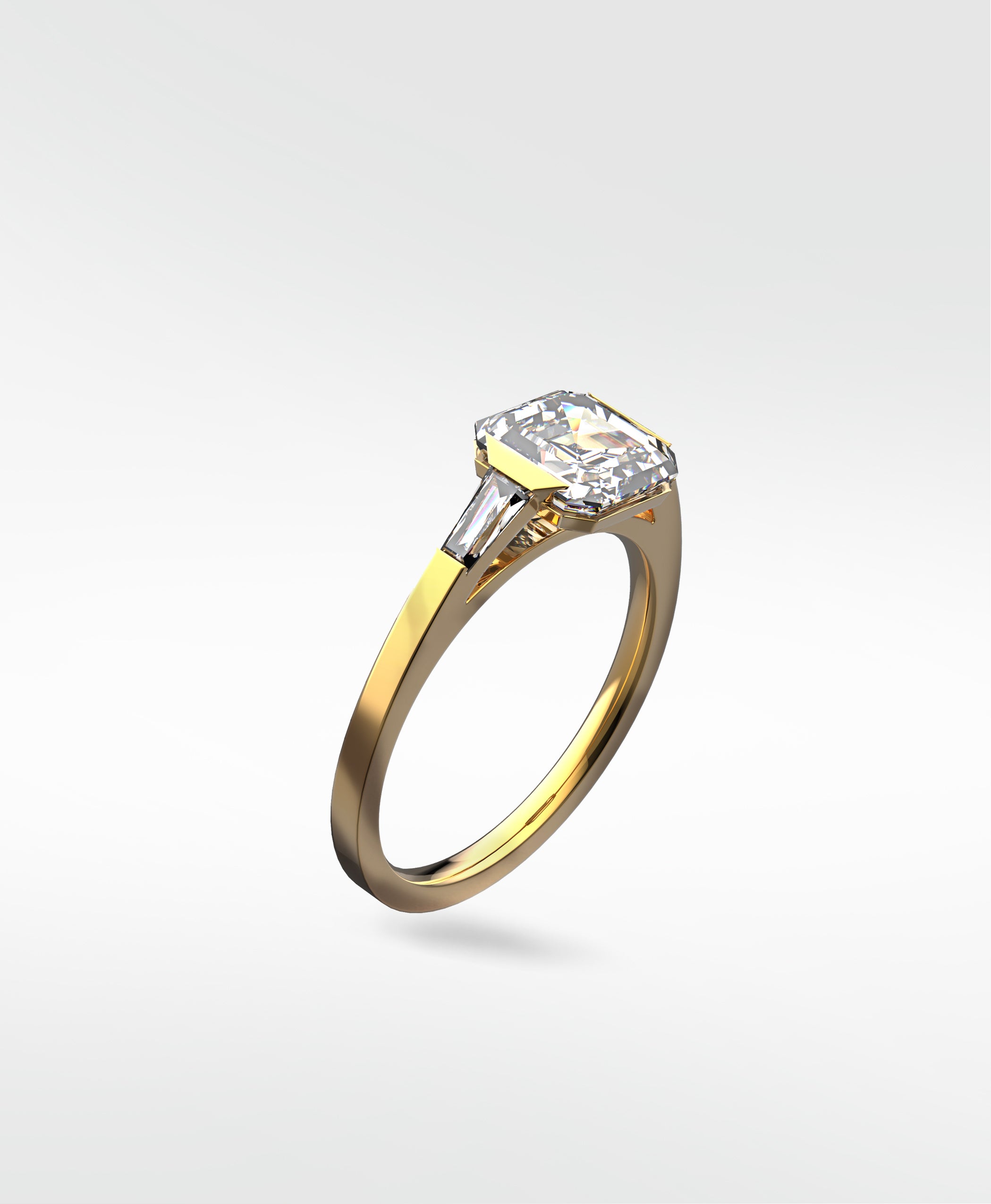 Gold ring with a diamond on a white background