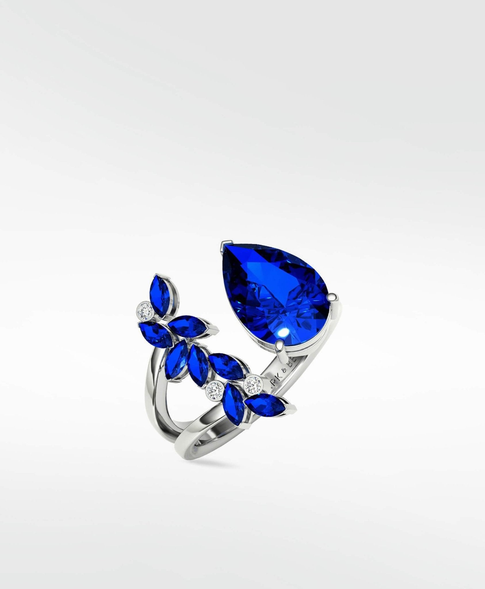 Veto Blue Sapphire Open Petal Cocktail Ring in 18K White Gold - Lark and Berry